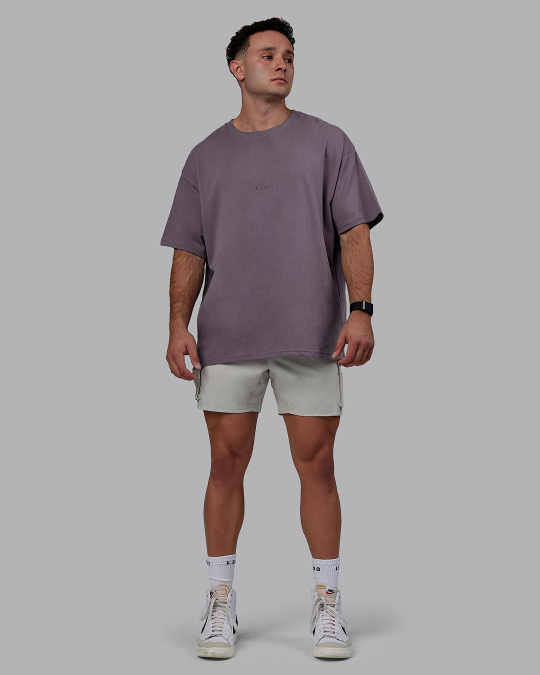 Man wearing MVP Heavyweight Tee Oversize - Purple Sage