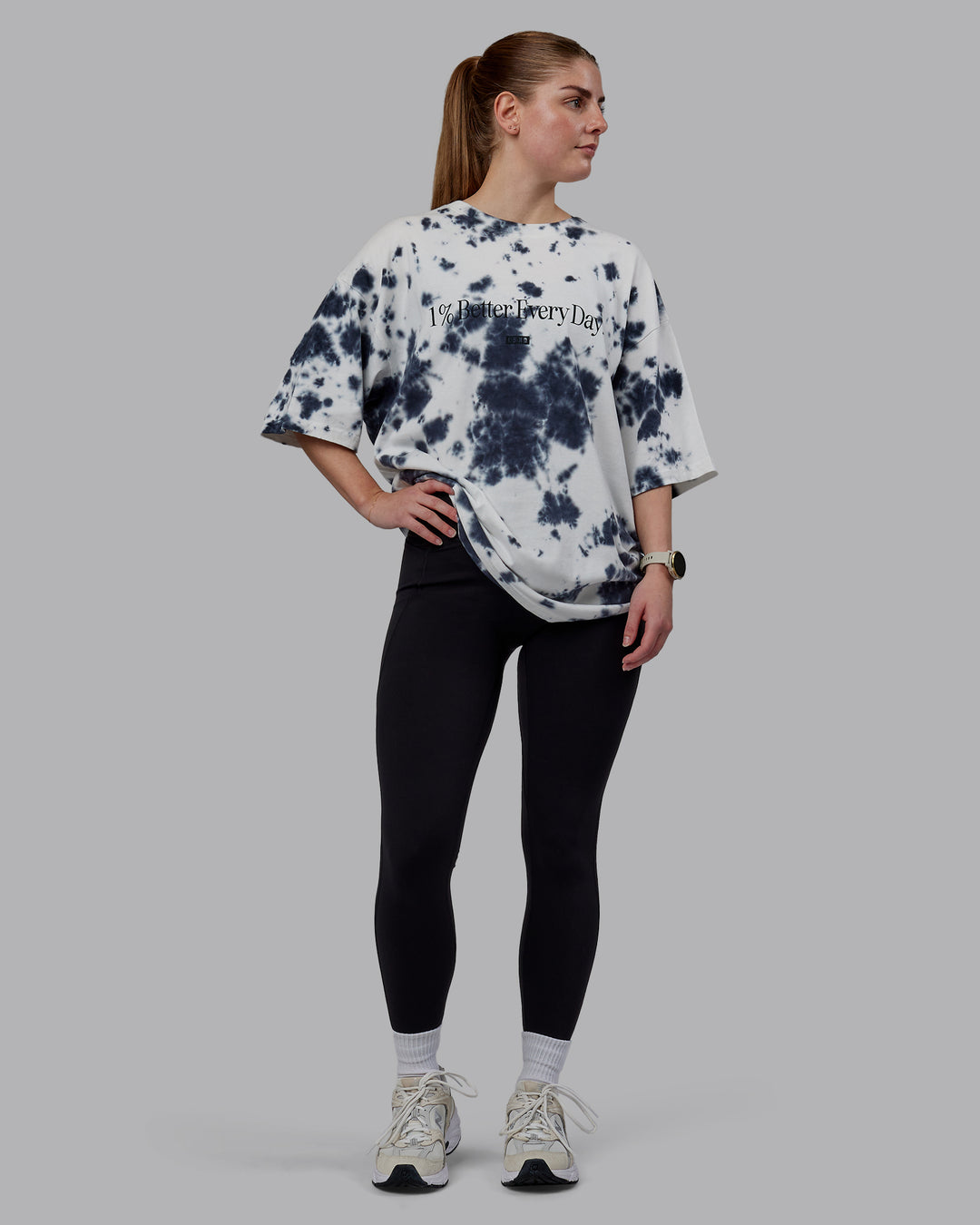 Woman wearing Unisex 1% Better Heavyweight Tee Oversize - White-Black Tie Dye