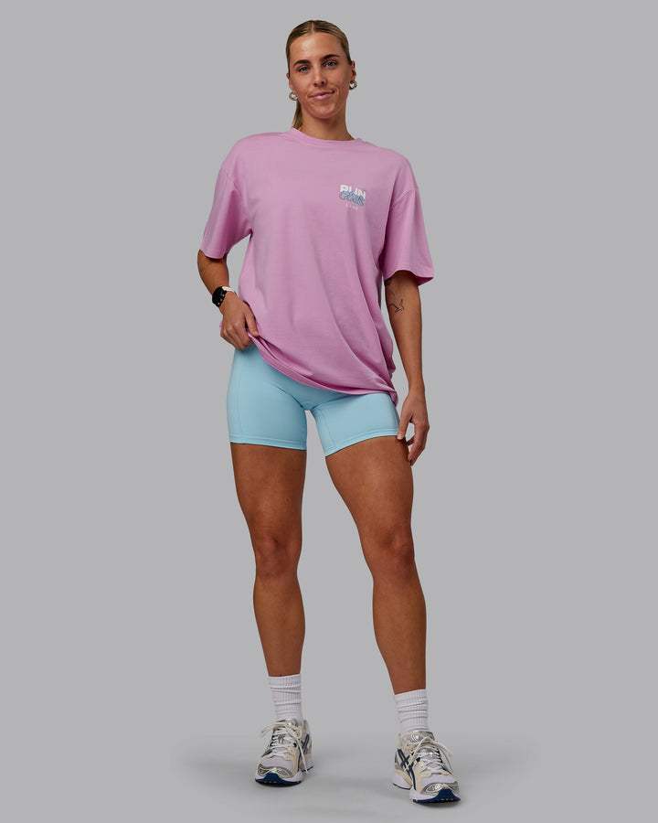 Woman wearing Unisex Gone Running FLXCotton Tee Oversize - Bubblegum-Skyride
