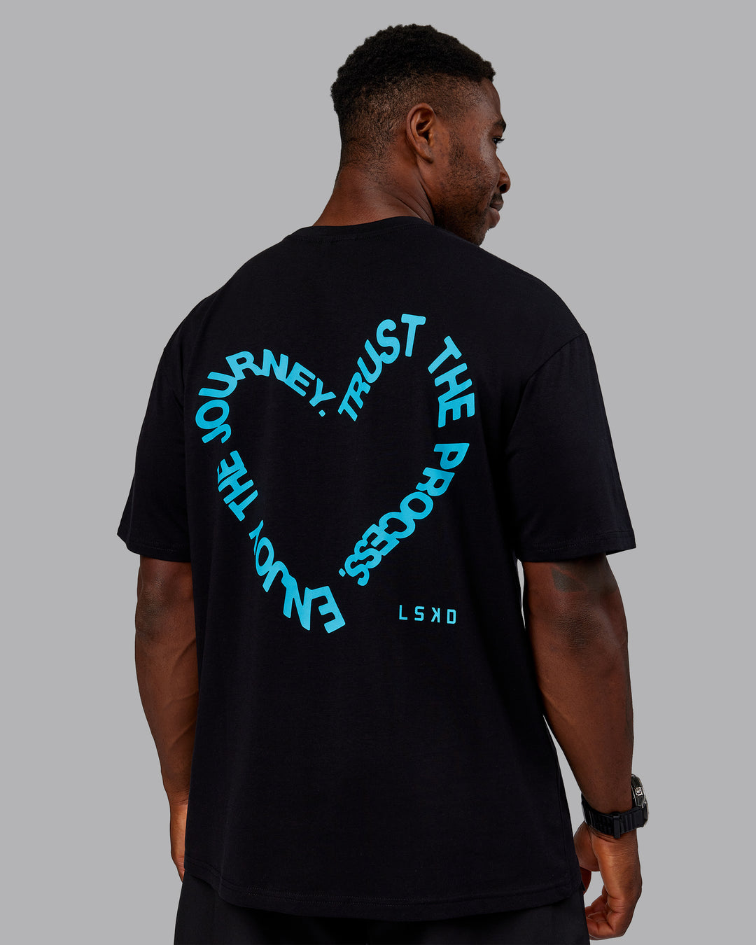 Man wearing Love The Process FLXCotton Oversize Tee - Black-Blue Atoll | Model:Sam | Size:L