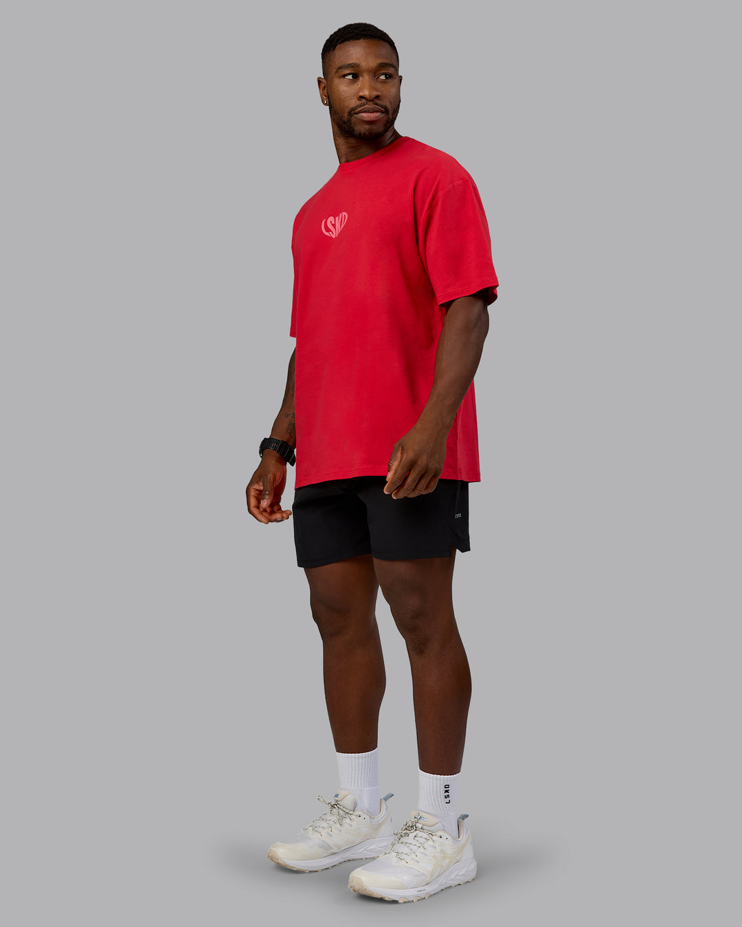 Man wearing Unisex Love To Train FLXCotton Tee Oversize in Scarlet-Pink Lemonade | Size:L