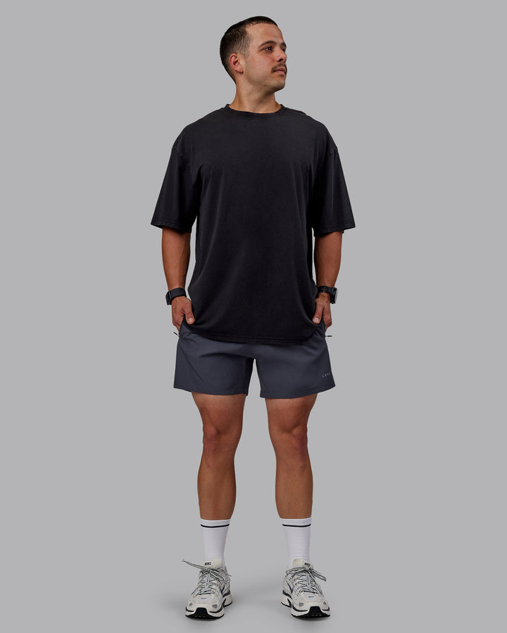 Man wearing Set The Standard Washed FLXCotton Oversized Tee in Black-Black | Size:L
