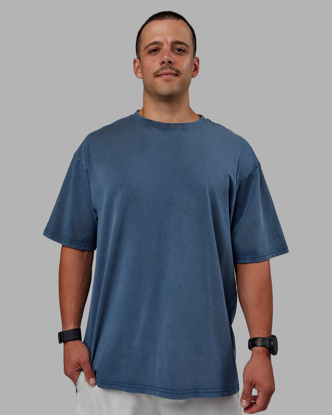 Man wearing Set The Standard Washed FLXCotton Oversized Tee in Indigo | Size:L