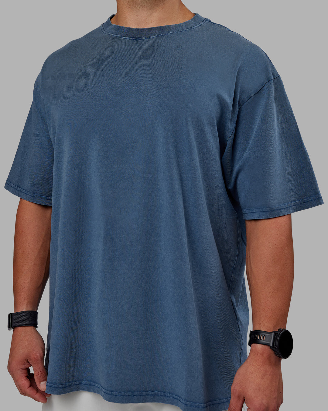 Man wearing Set The Standard Washed FLXCotton Oversized Tee in Indigo | Size:L