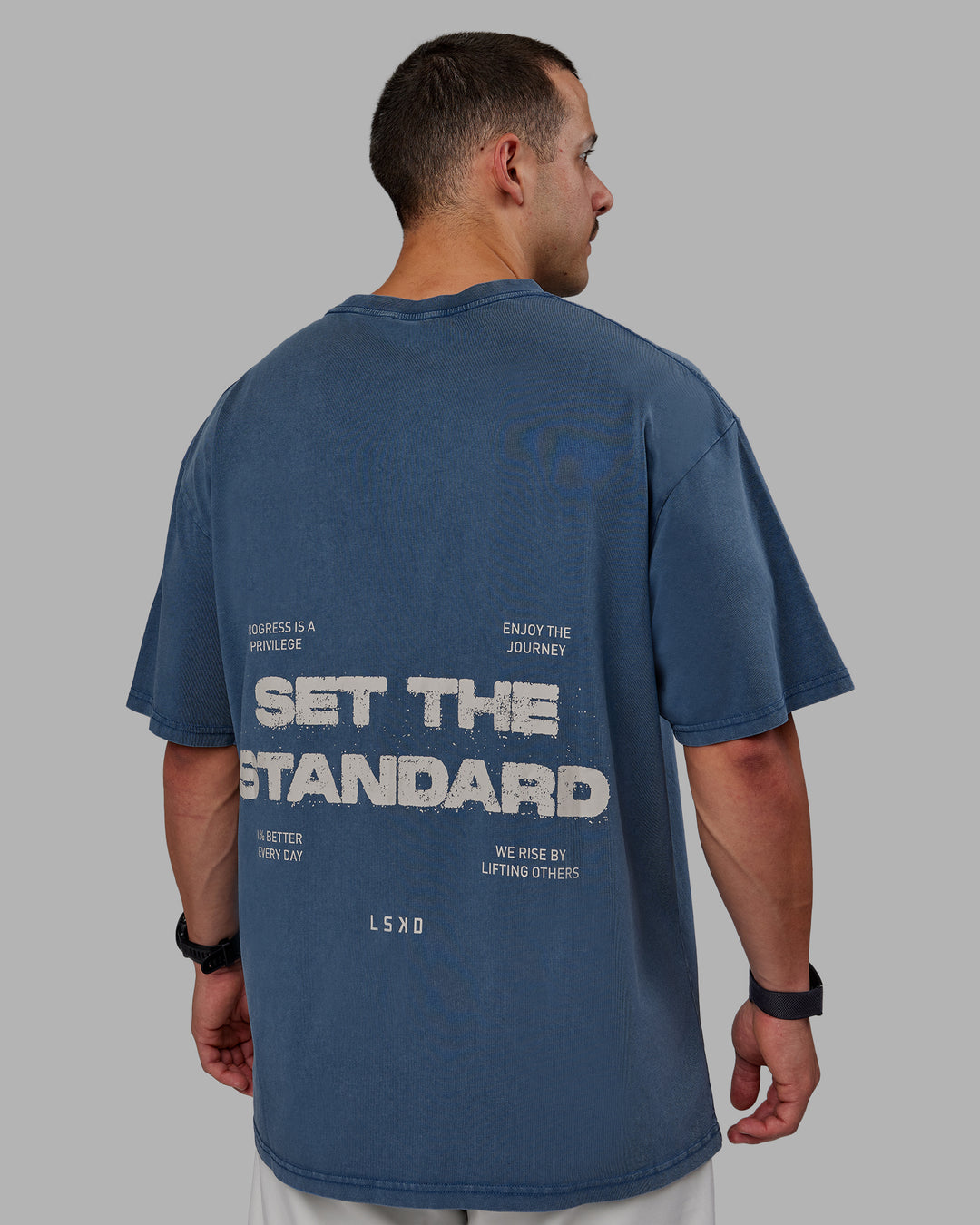 Man wearing Set The Standard Washed FLXCotton Oversized Tee in Indigo | Size:L