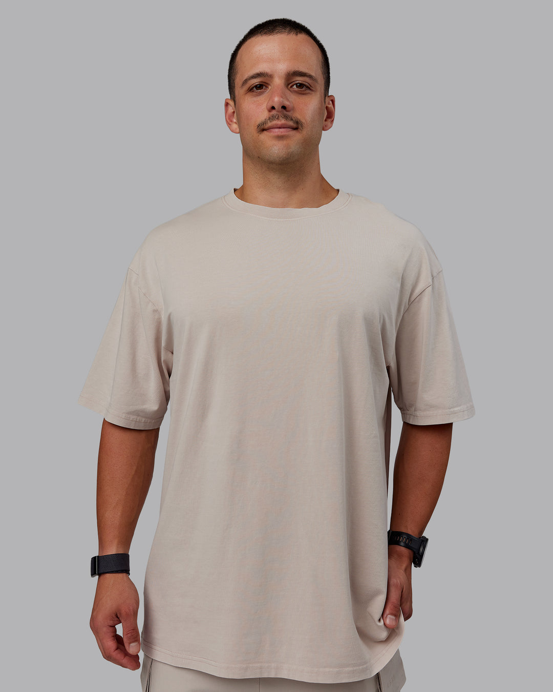 Man wearing Set The Standard Washed FLXCotton Oversized Tee - Shale Beige | Size:L