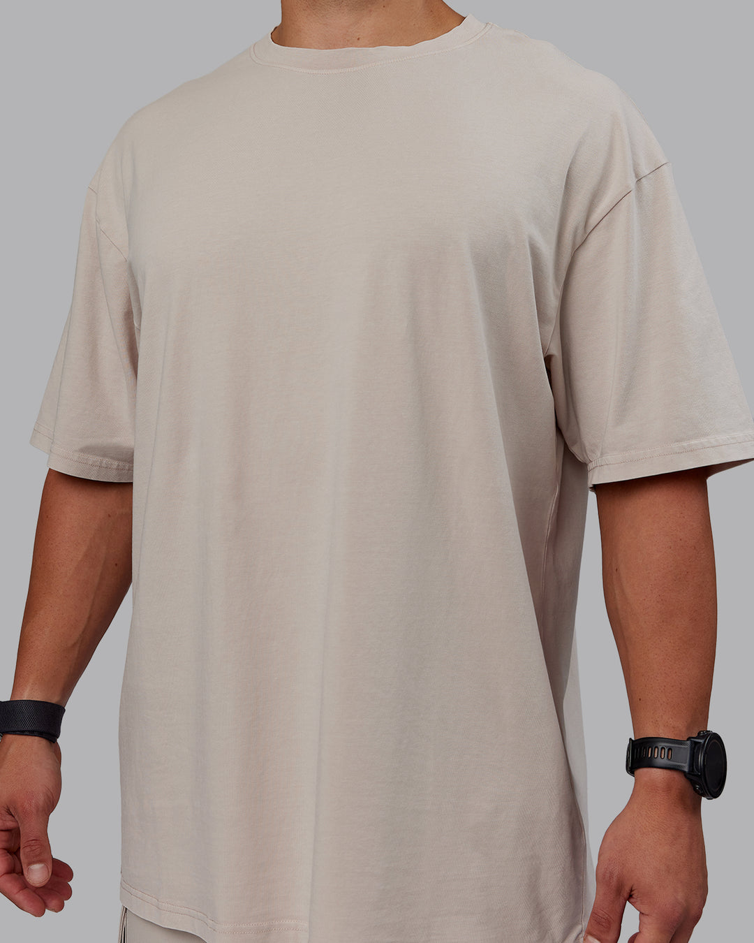 Man wearing Set The Standard Washed FLXCotton Oversized Tee - Shale Beige | Size:L