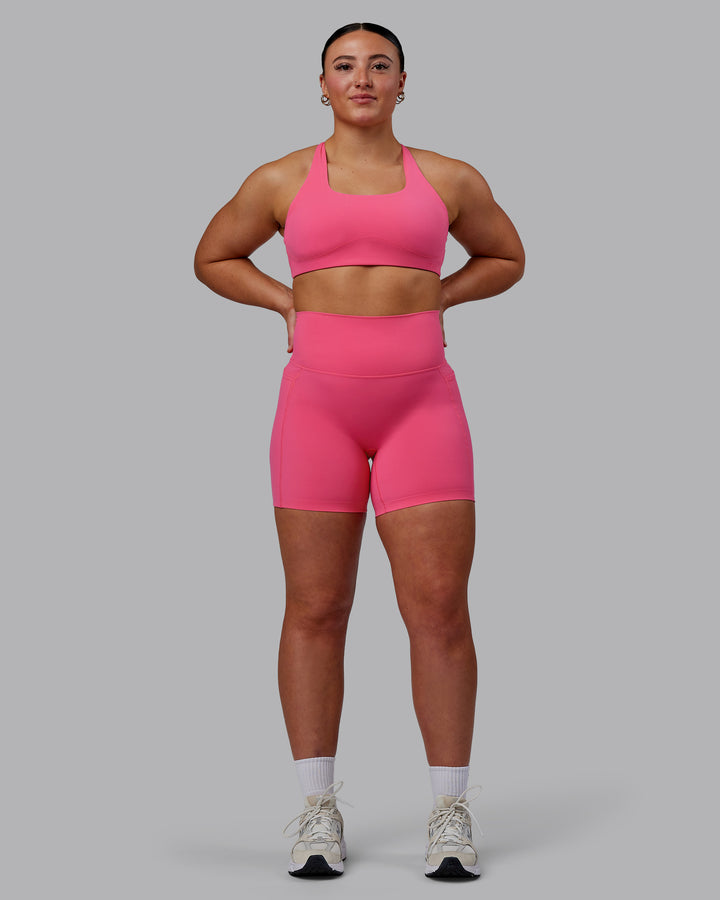 Woman wearing Aspire Sports Bra - Carmine Rose
