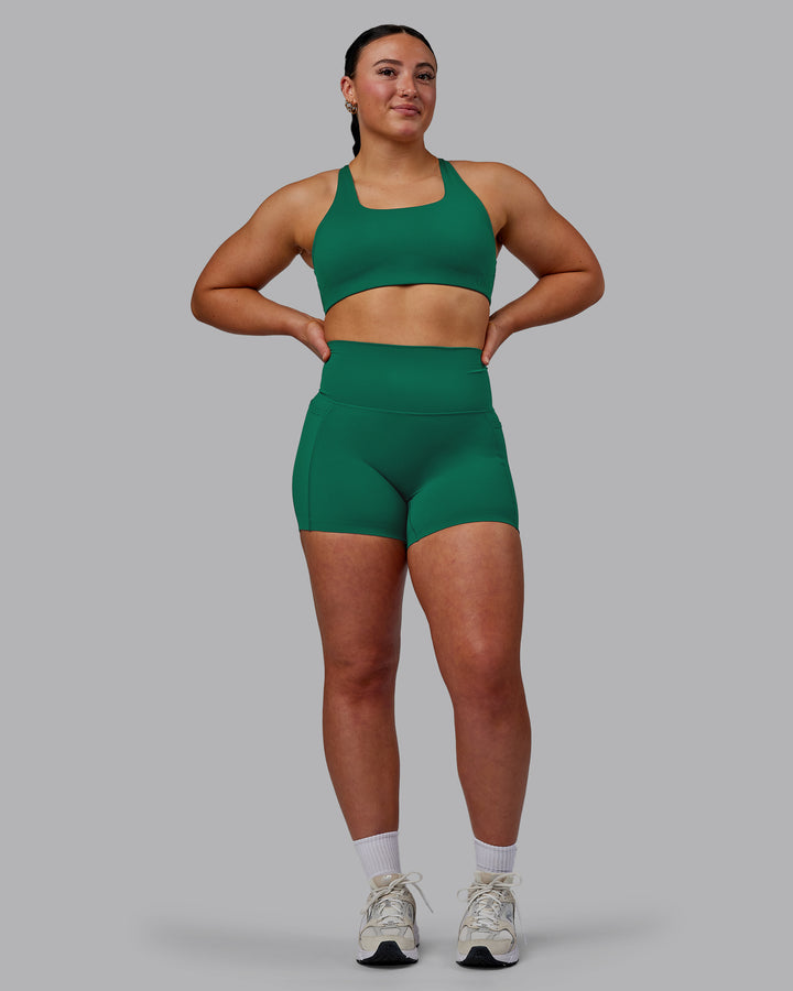 Woman wearing Elixir X-Short Tights With Pockets - Malachite
