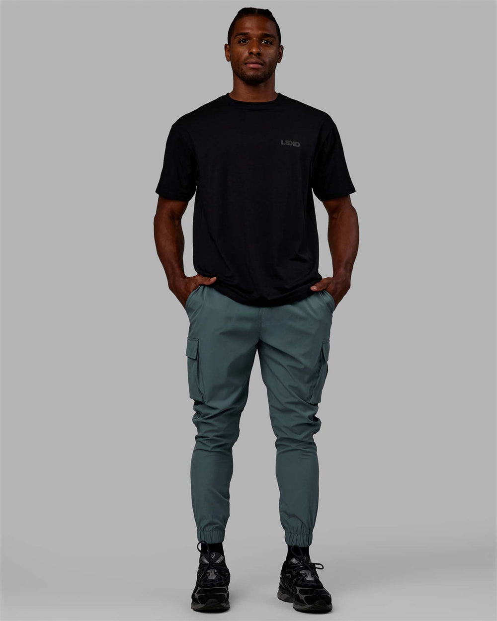 Man wearing Energy Stretch Performance Cargo Joggers - Storm