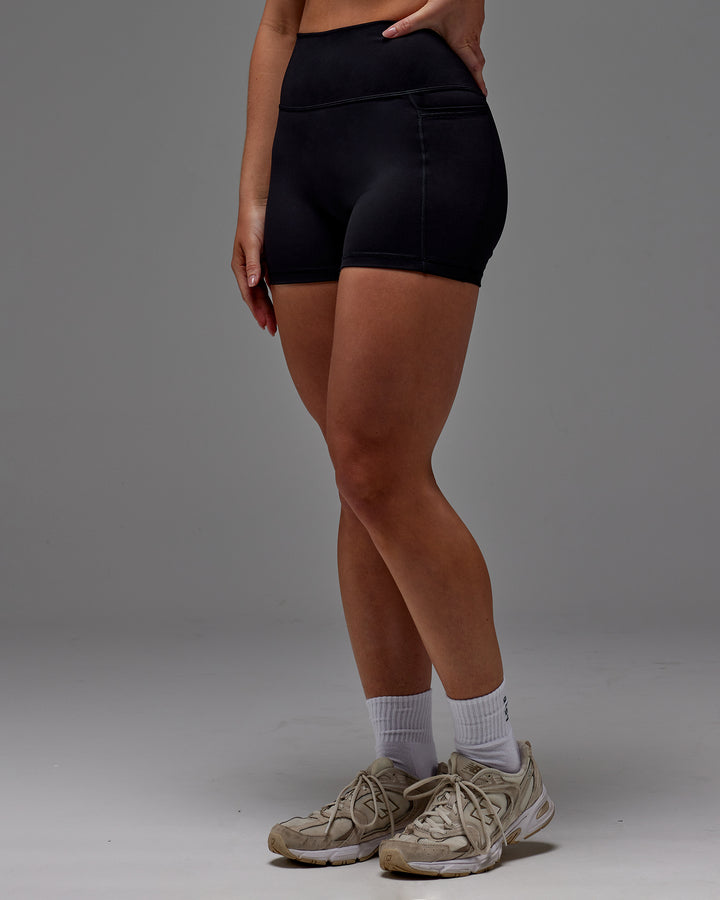 Woman wearing Fusion X-Short Tight With Pockets in Black | Model:Meg | Size:M
