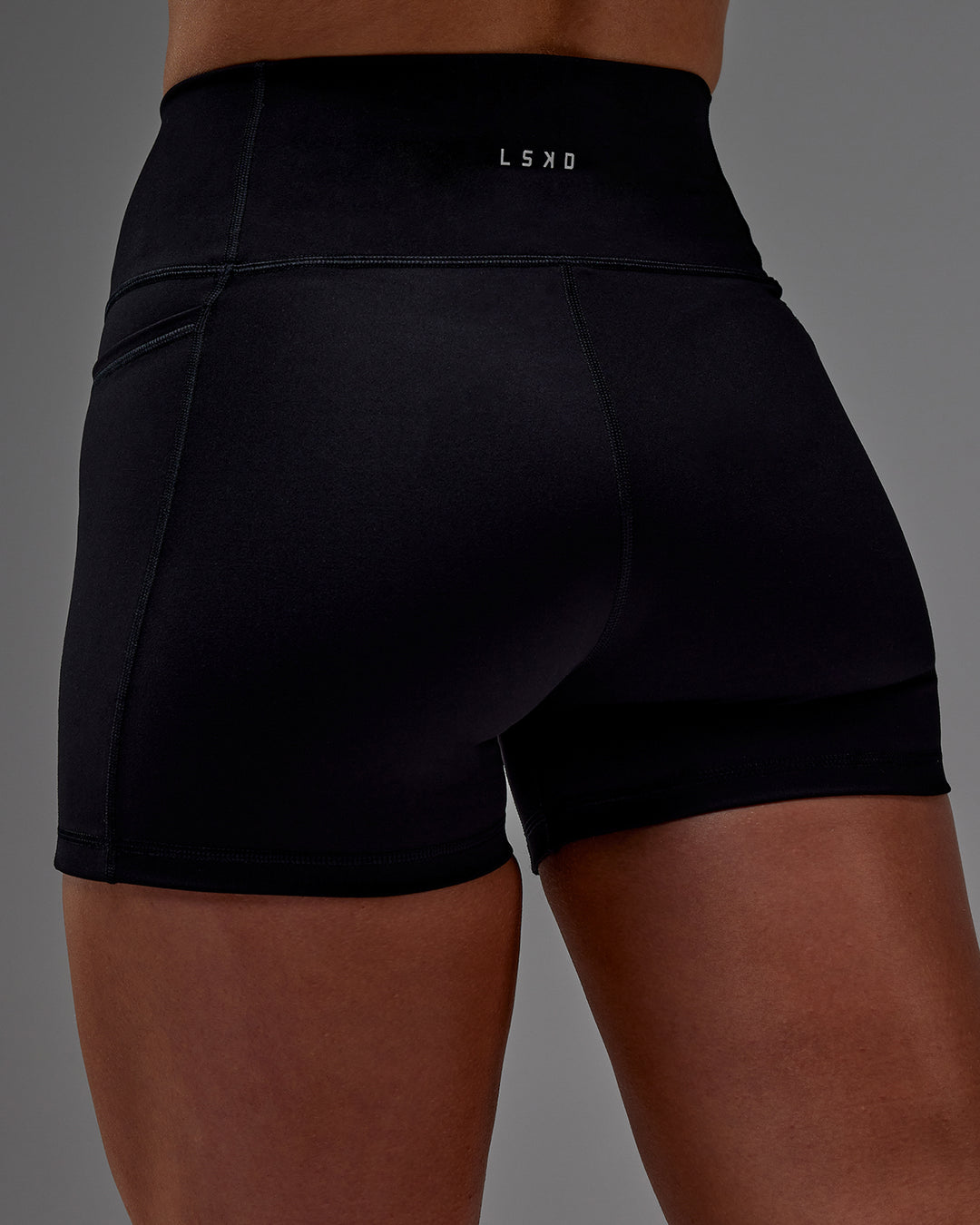 Woman wearing Fusion X-Short Tight With Pockets in Black | Model:Meg | Size:M