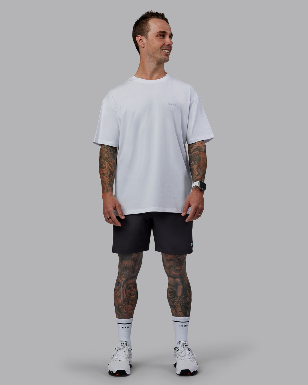 Man wearing LSKD x Logan Martin FLXCotton Tee Oversize - White-Windsurfer