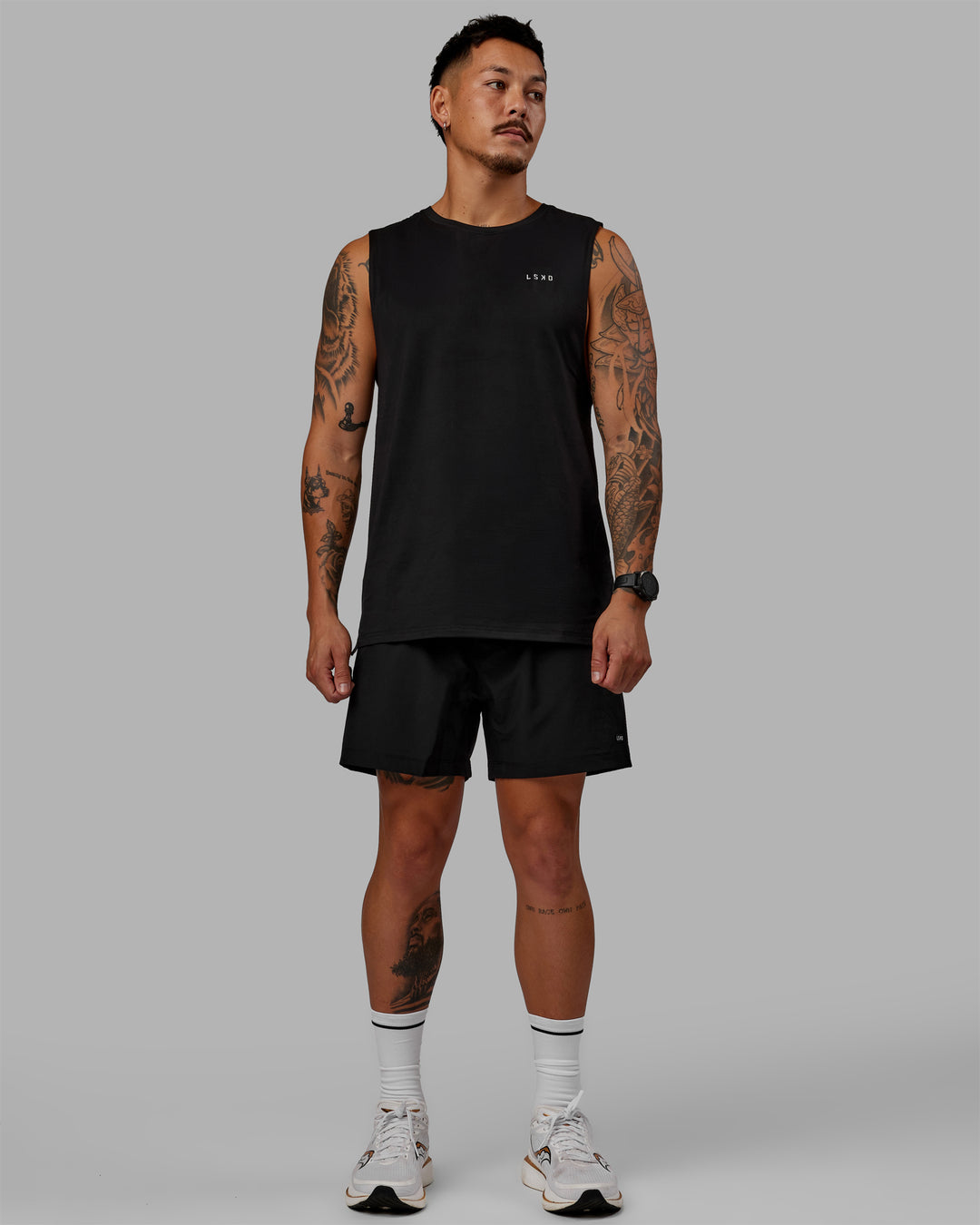 Man wearing Perform VapourFLX Muscle Tank - Black-Reflective