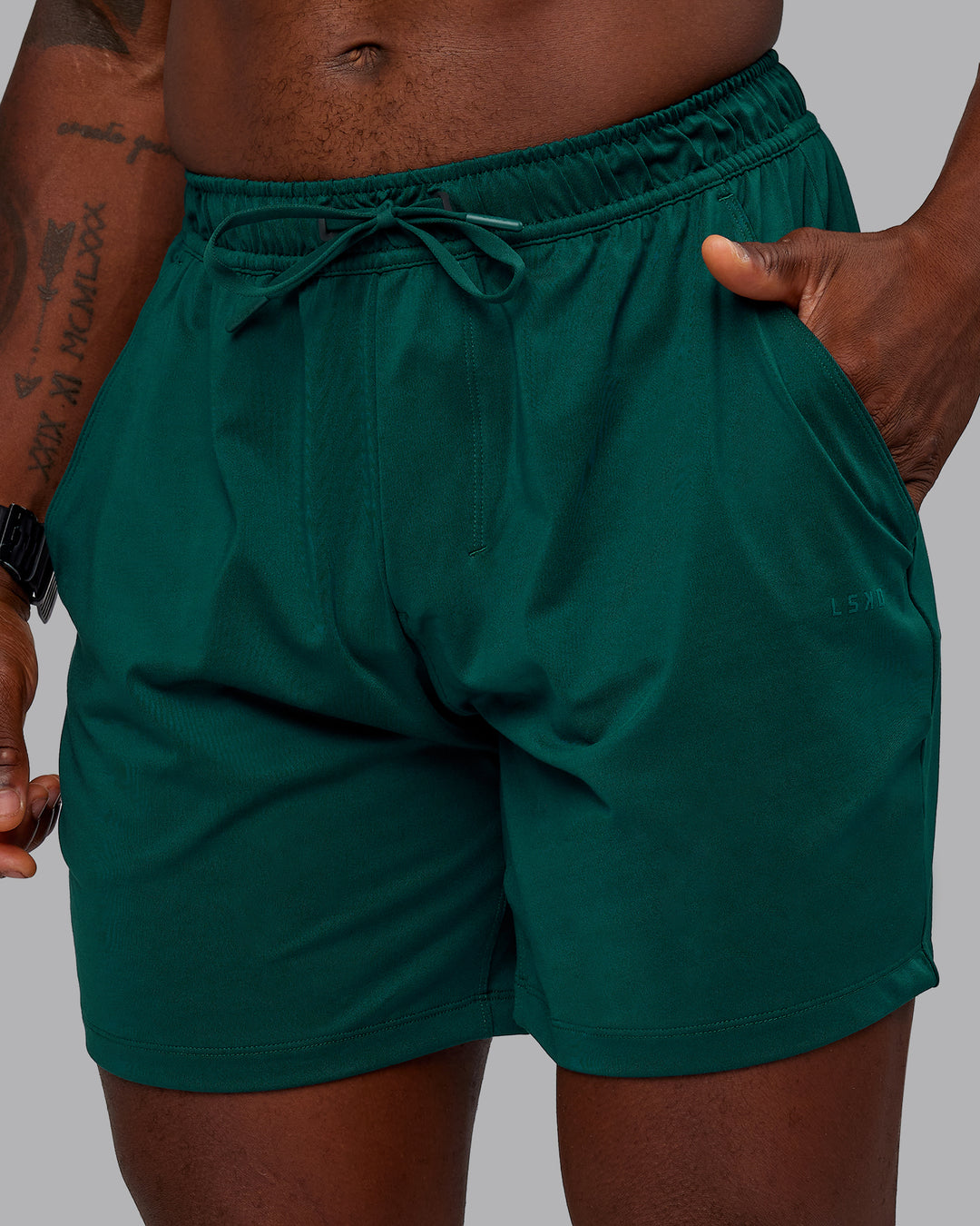 Man wearing Restore CloudFLX Short in Dark Moss | Size:M | Model:Sam