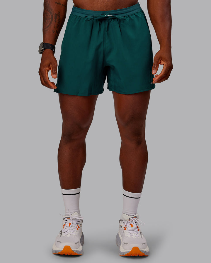 Man wearing Pace Lined Performance Short  5&quot; in Dark Moss | Size:M
