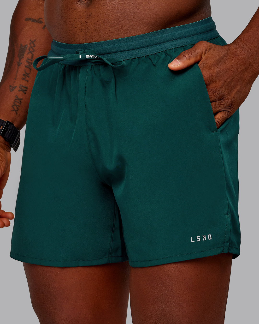 Man wearing Pace Lined Performance Short  5&quot; in Dark Moss | Size:M