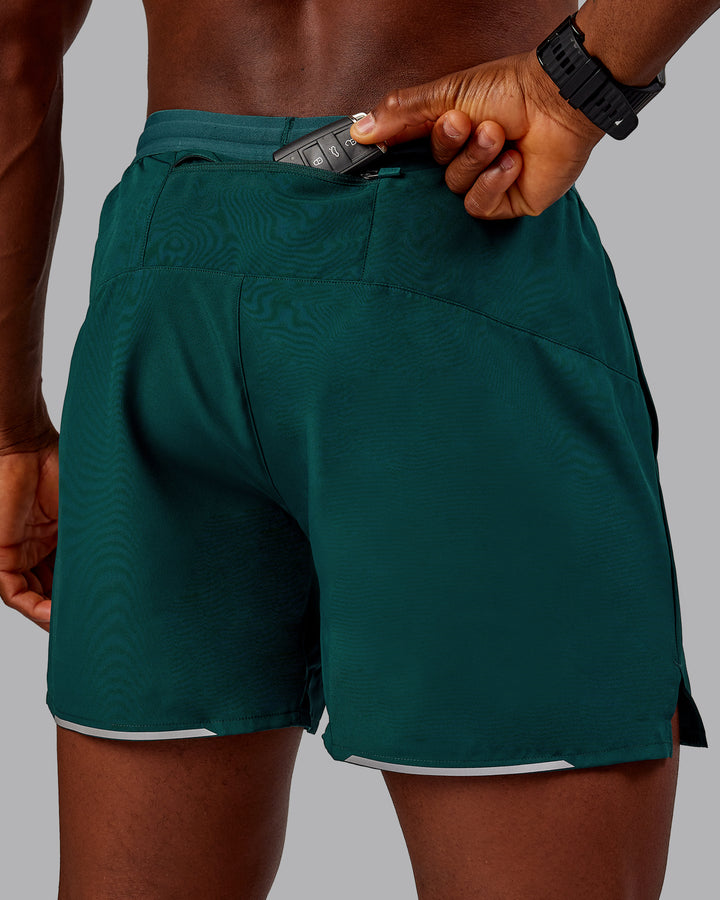 Man wearing Pace Lined Performance Short  5&quot; in Dark Moss | Size:M
