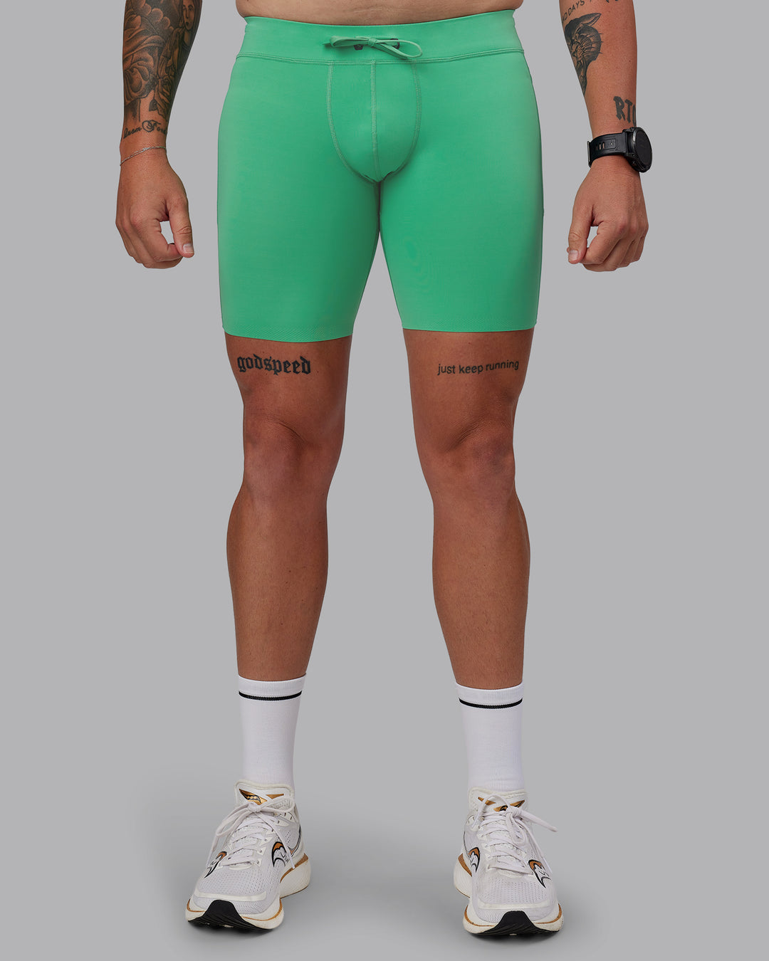 Man wearing Race Day Short Tight 8&quot; in Mystic Green | Size:M