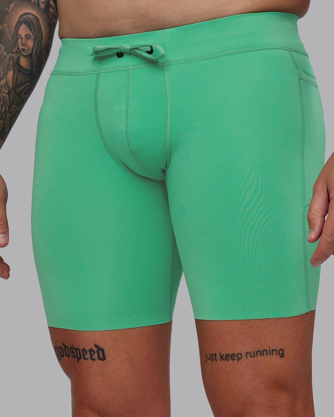 Man wearing Race Day Short Tight 8&quot; in Mystic Green | Size:M