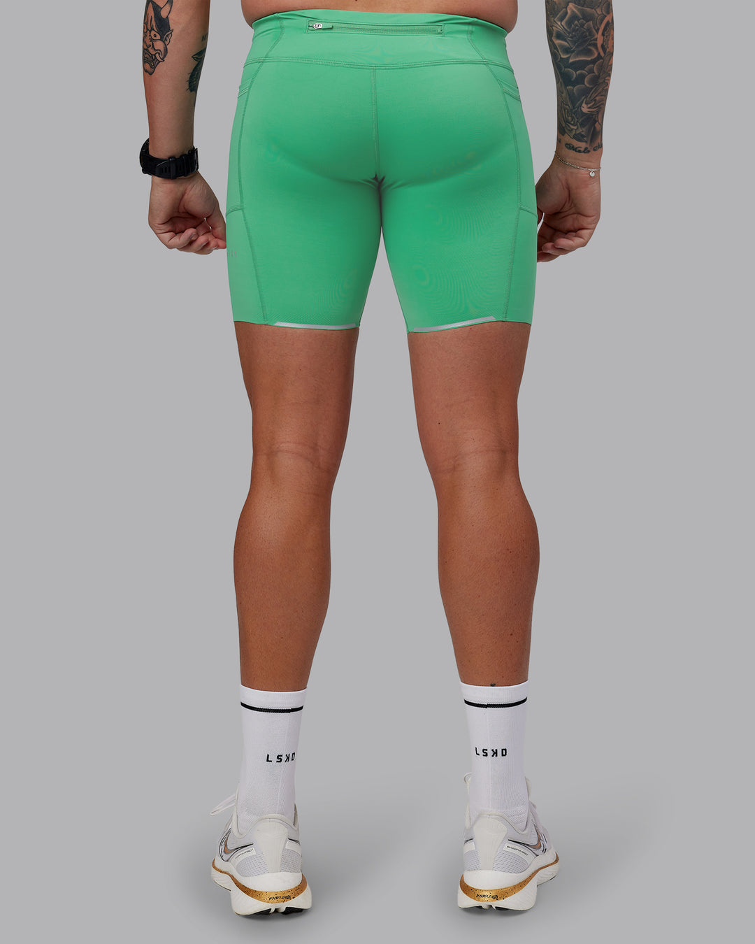 Man wearing Race Day Short Tight 8&quot; in Mystic Green | Size:M