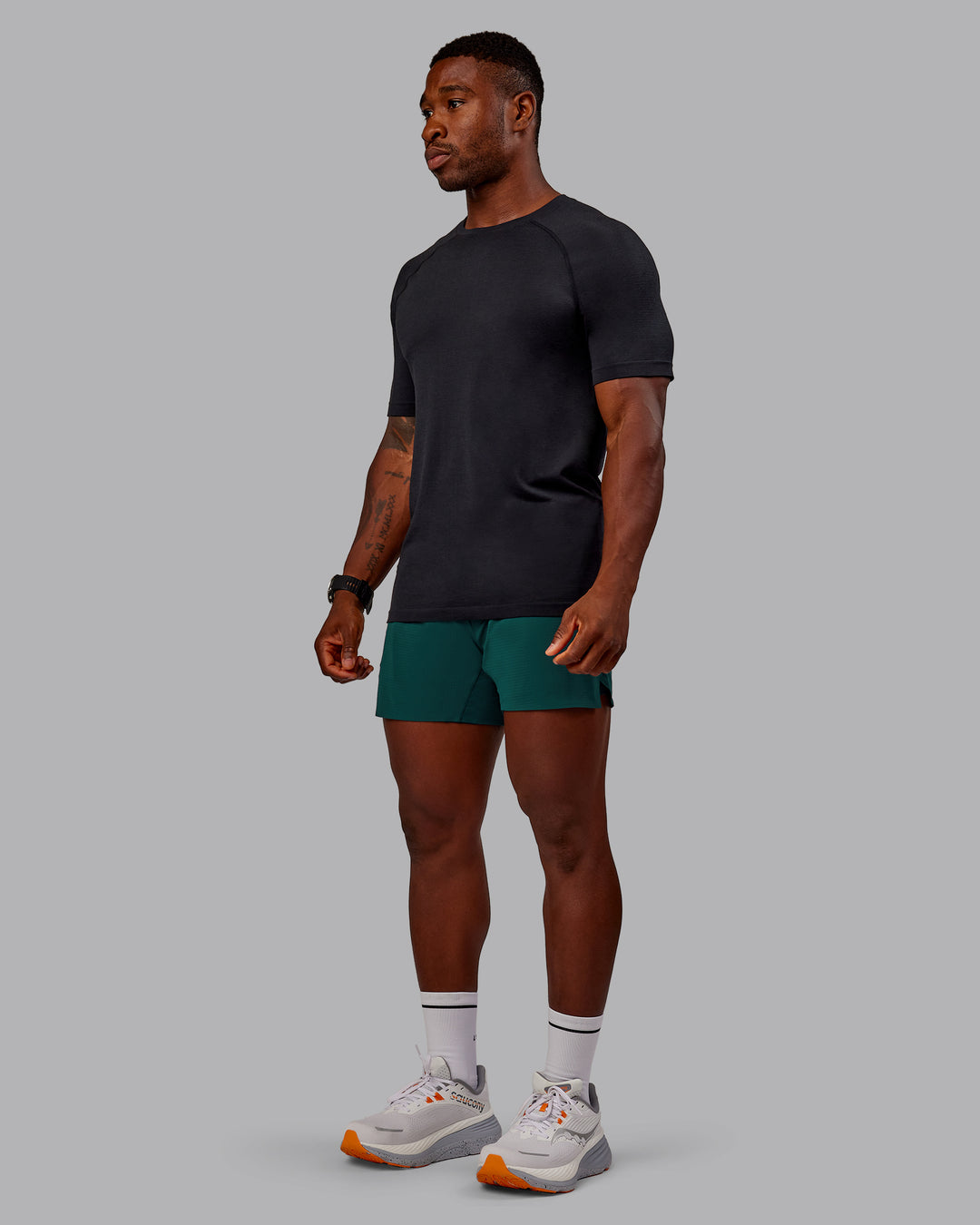 Man wearing UltraAir 5&quot; Lined Performance Short in Dark Moss | Size:M