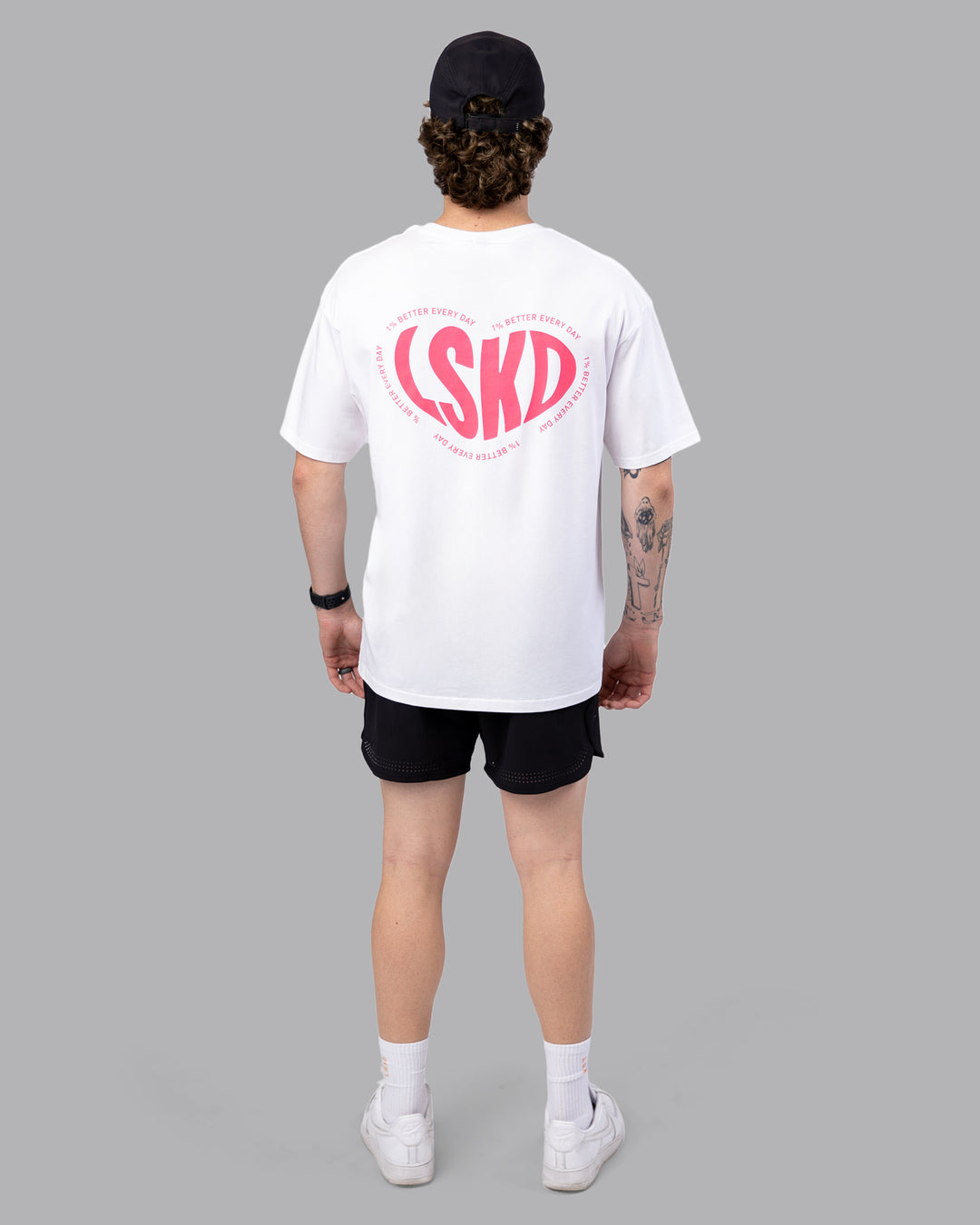 Man wearing Unisex Love To Train FLXCotton Tee Oversize - White-Pink Lemonade | Size:M