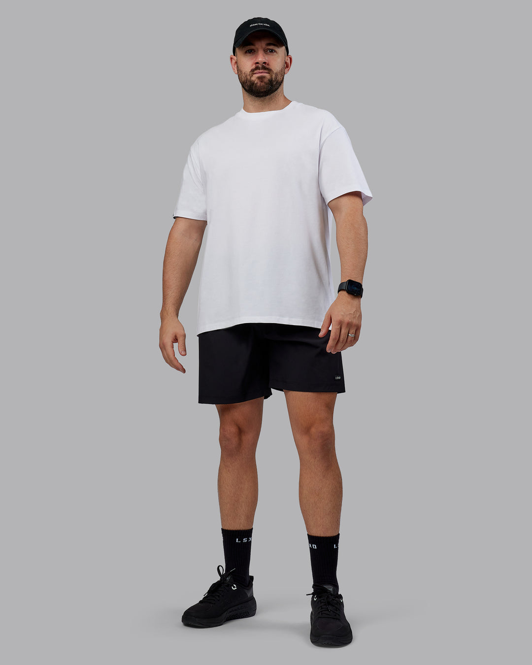 Man wearing Peaches Pilates x LSKD FLXCotton Tee Oversize - White