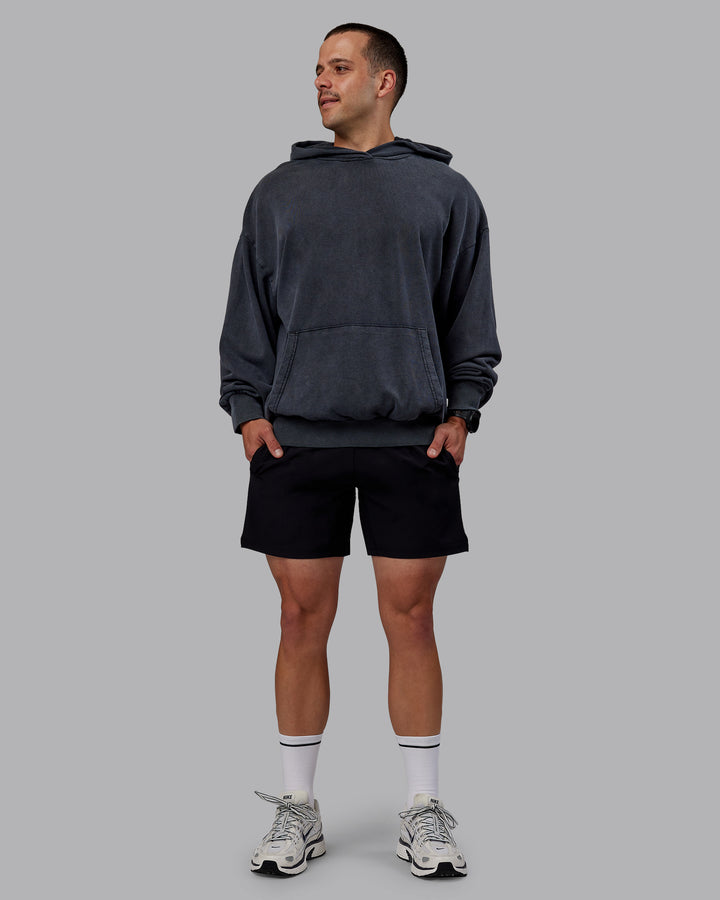 Man wearing Set the Standard Washed Oversized Hoodie in Black-Black | Size:M
