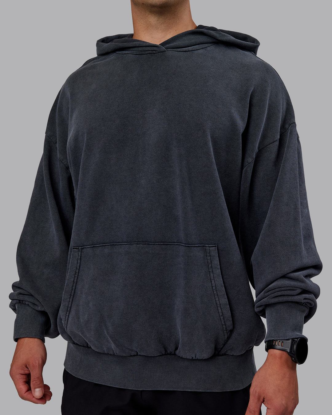 Man wearing Set the Standard Washed Oversized Hoodie in Black-Black | Size:M