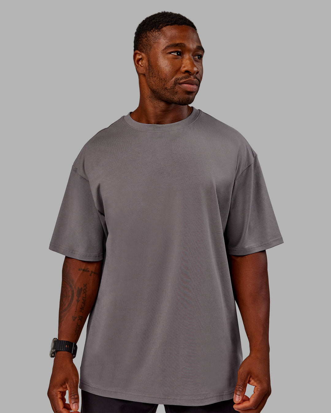 Man wearing Variation FLXCotton Oversized Tee in Storm Front-Pale Banana | Size:M