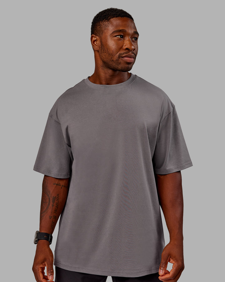 Man wearing Variation FLXCotton Oversized Tee in Storm Front-Pale Banana | Size:M
