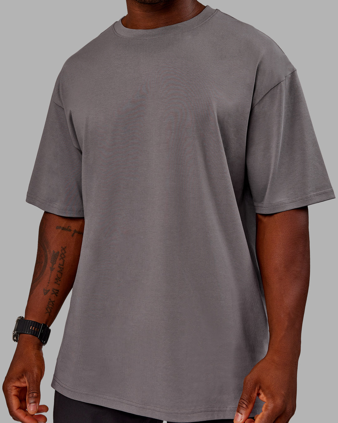 Man wearing Variation FLXCotton Oversized Tee in Storm Front-Pale Banana | Size:M