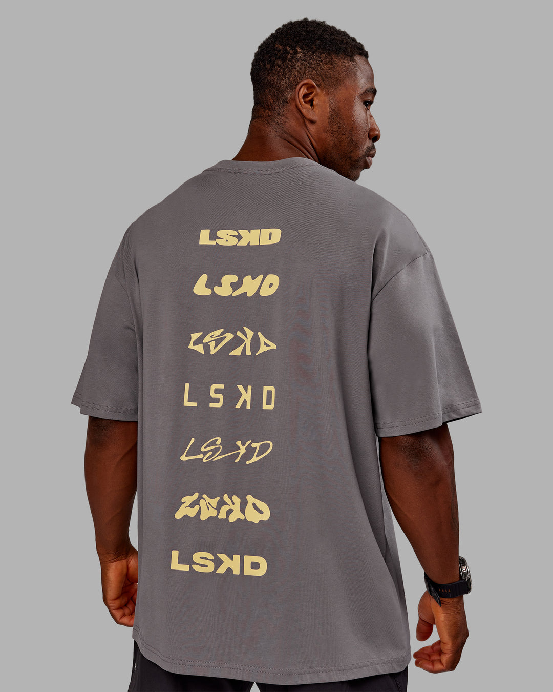 Man wearing Variation FLXCotton Oversized Tee in Storm Front-Pale Banana | Size:M