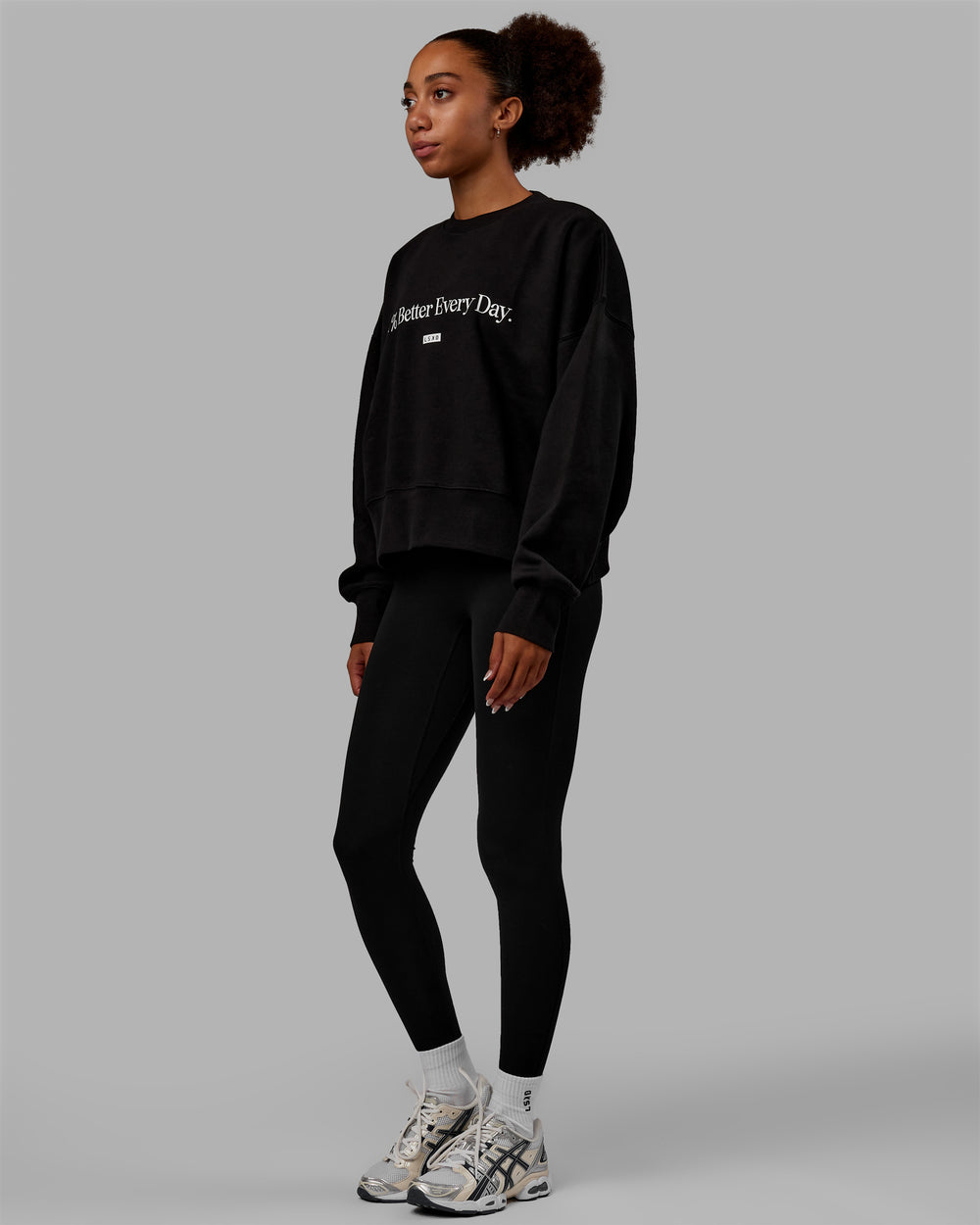 Woman wearing 1% Better Heavyweight Sweater - Black-White