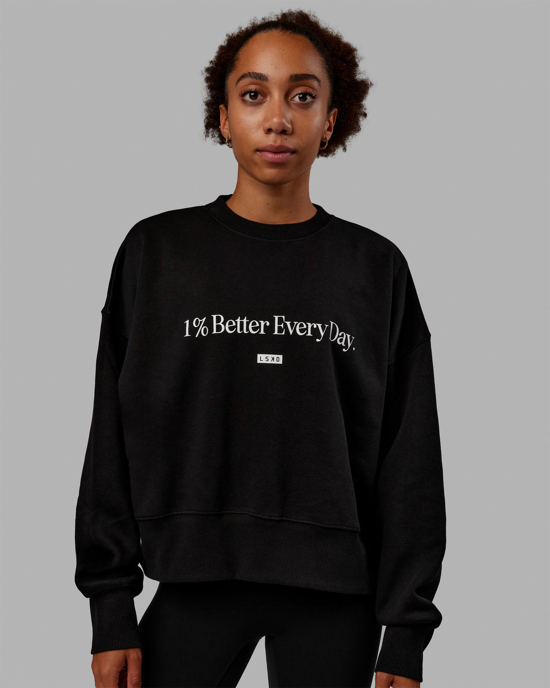 Woman wearing 1% Better Heavyweight Sweater - Black-White