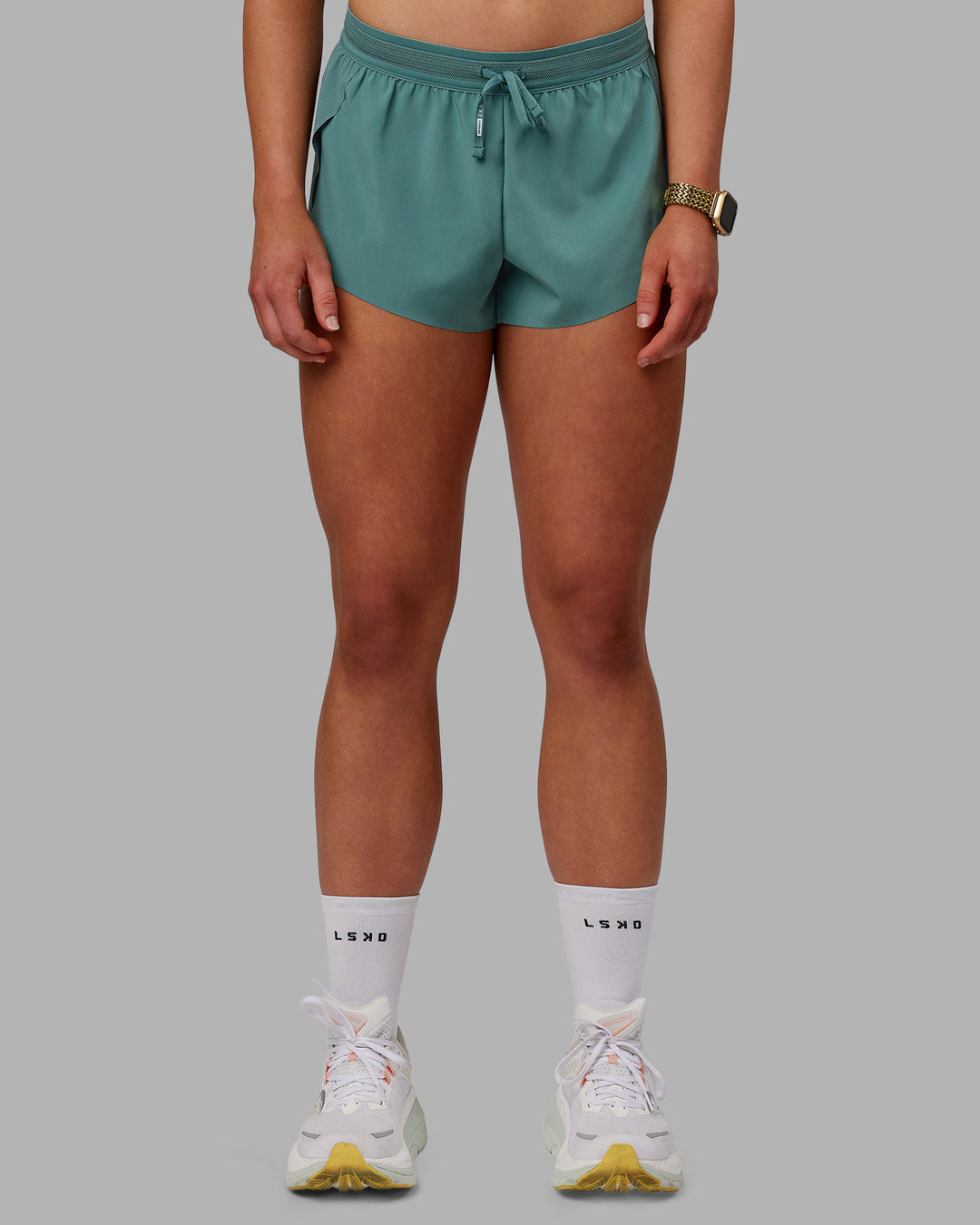 Woman wearing Accelerate 3&quot; Run Shorts - Sagebrush