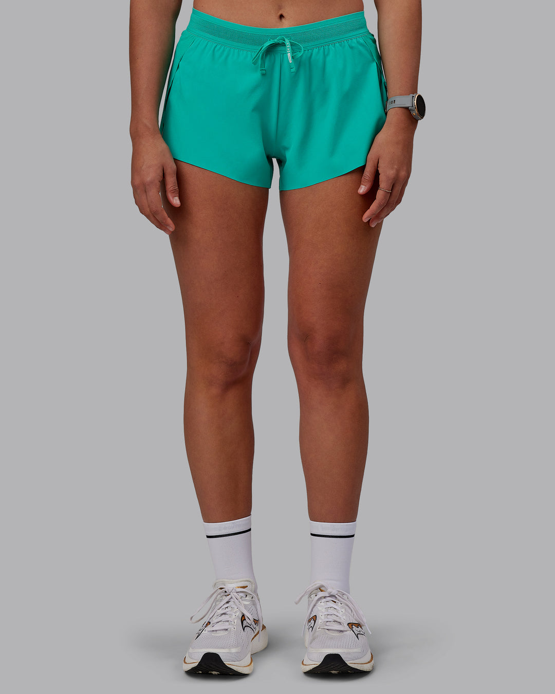 Woman wearing Accelerate Run Shorts - Atlantis