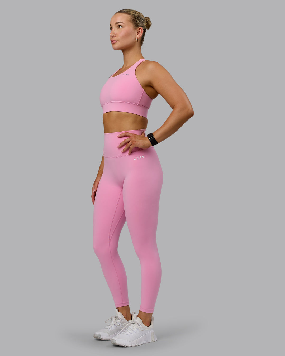 Woman wearing Accelerate Sports Bra - Bubblegum