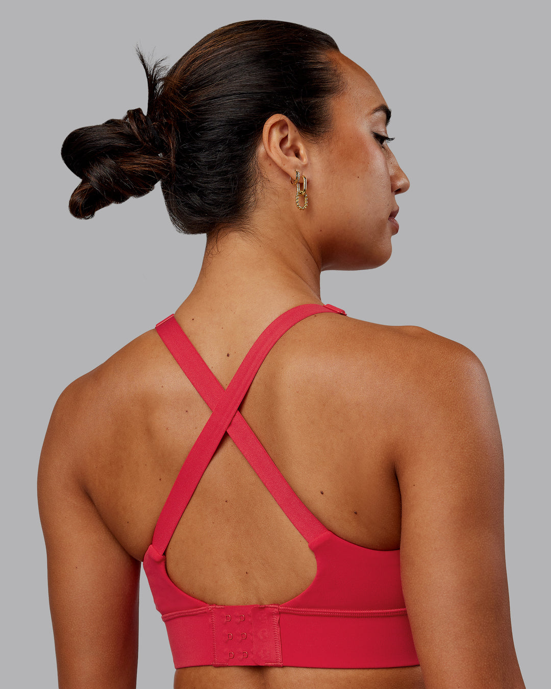 Woman wearing Accelerate Sports Bra - Scarlet