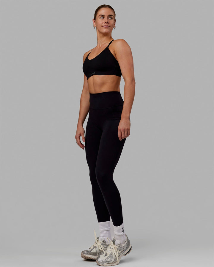 Woman wearing Adapt Sports Bra - Black
