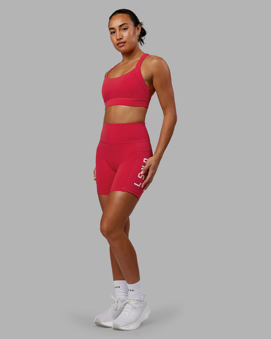 Woman wearing Advance Sports Bra - Scarlet