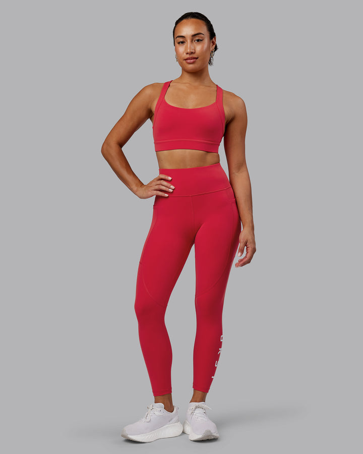 Woman wearing Advance Sports Bra - Scarlet
