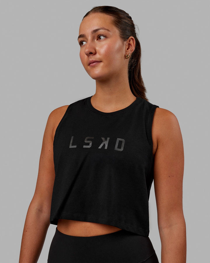 Woman wearing Agile FLXCotton Tank - Black-Black
