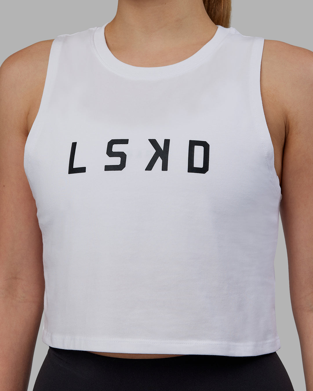 Woman wearing Agile FLXCotton Tank - White-Black