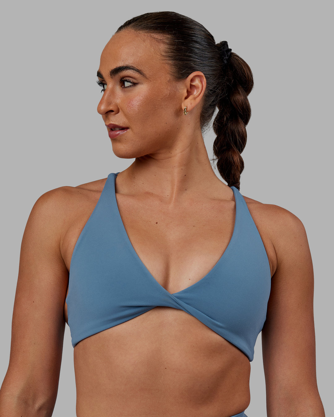 Woman wearing Agile Sports Bra - Elemental Blue