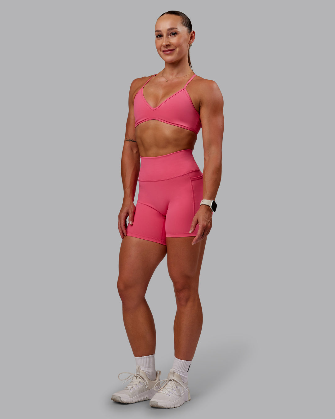 Woman wearing Ambience Sports Bra - Hot Pink