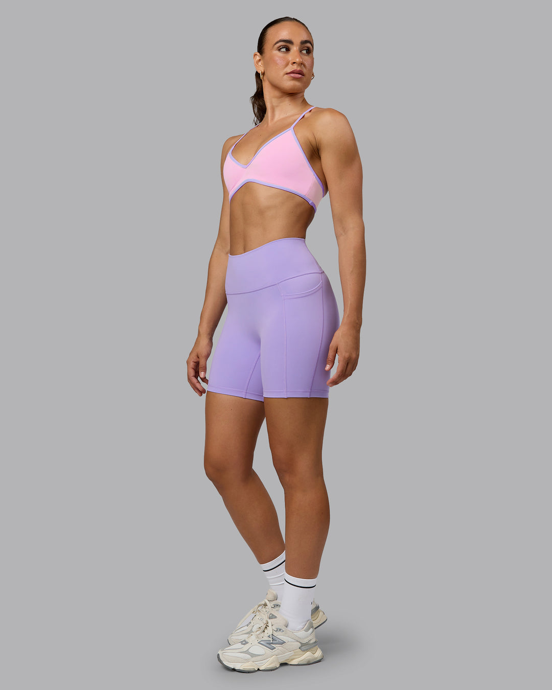 Woman wearing Ambience Sports Bra - Pale Pink-Pale Lilac