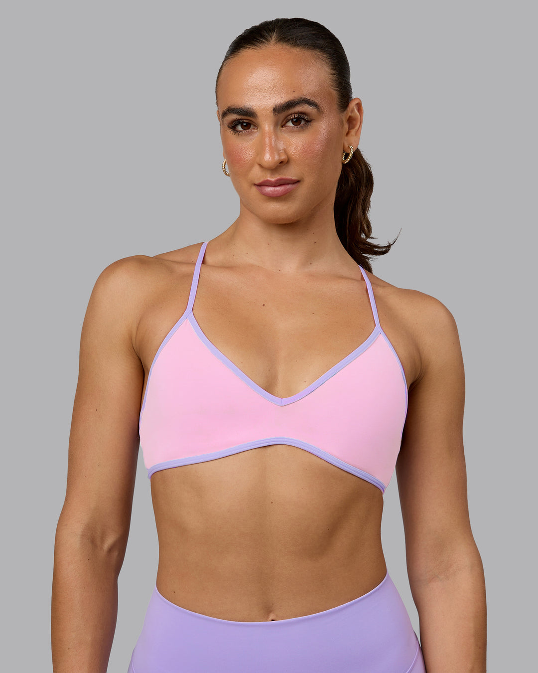 Woman wearing Ambience Sports Bra - Pale Pink-Pale Lilac