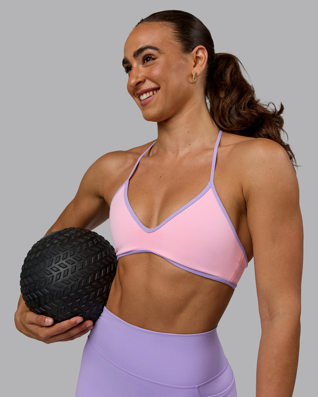 Woman wearing Ambience Sports Bra - Pale Pink-Pale Lilac